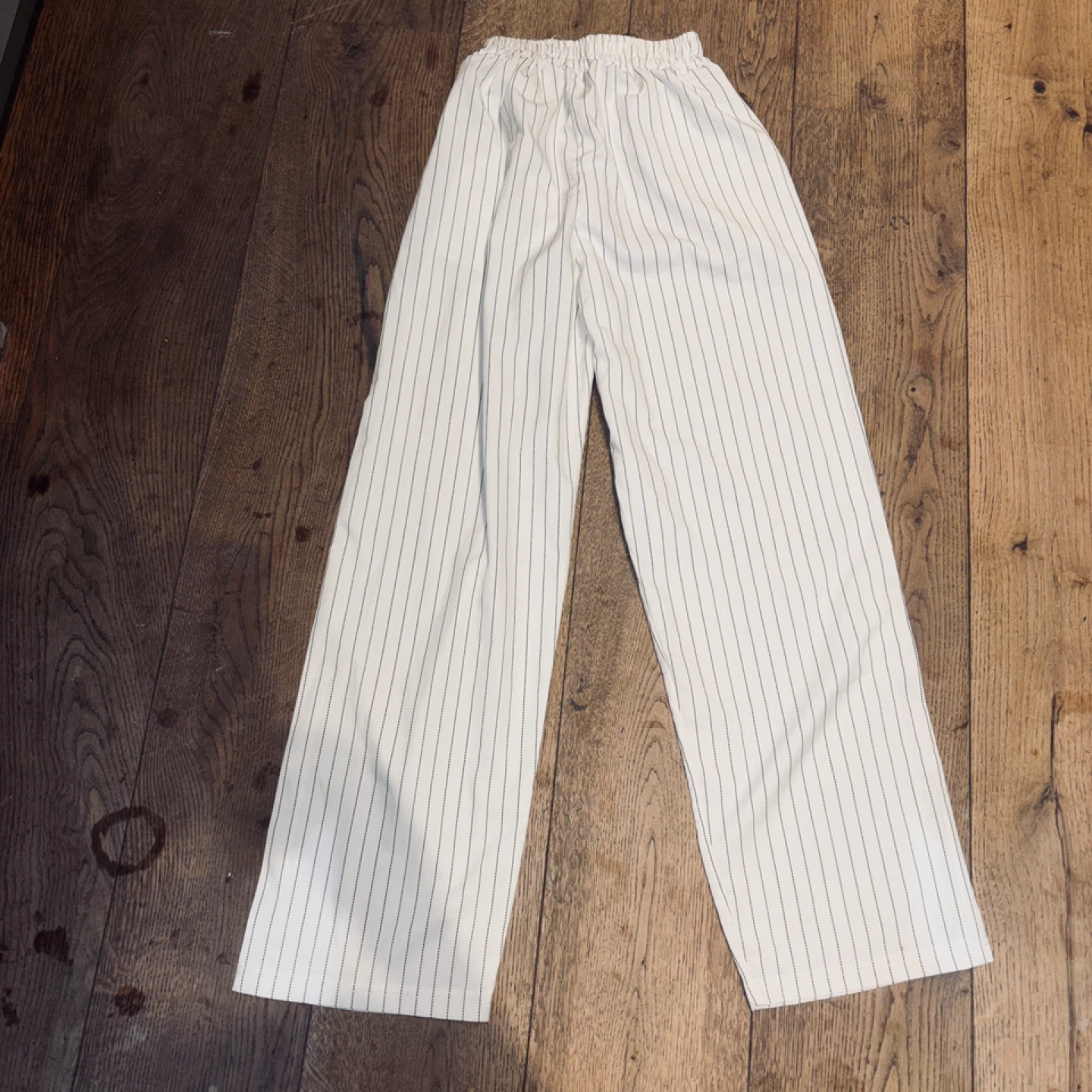 White pinstripe wide-leg pants