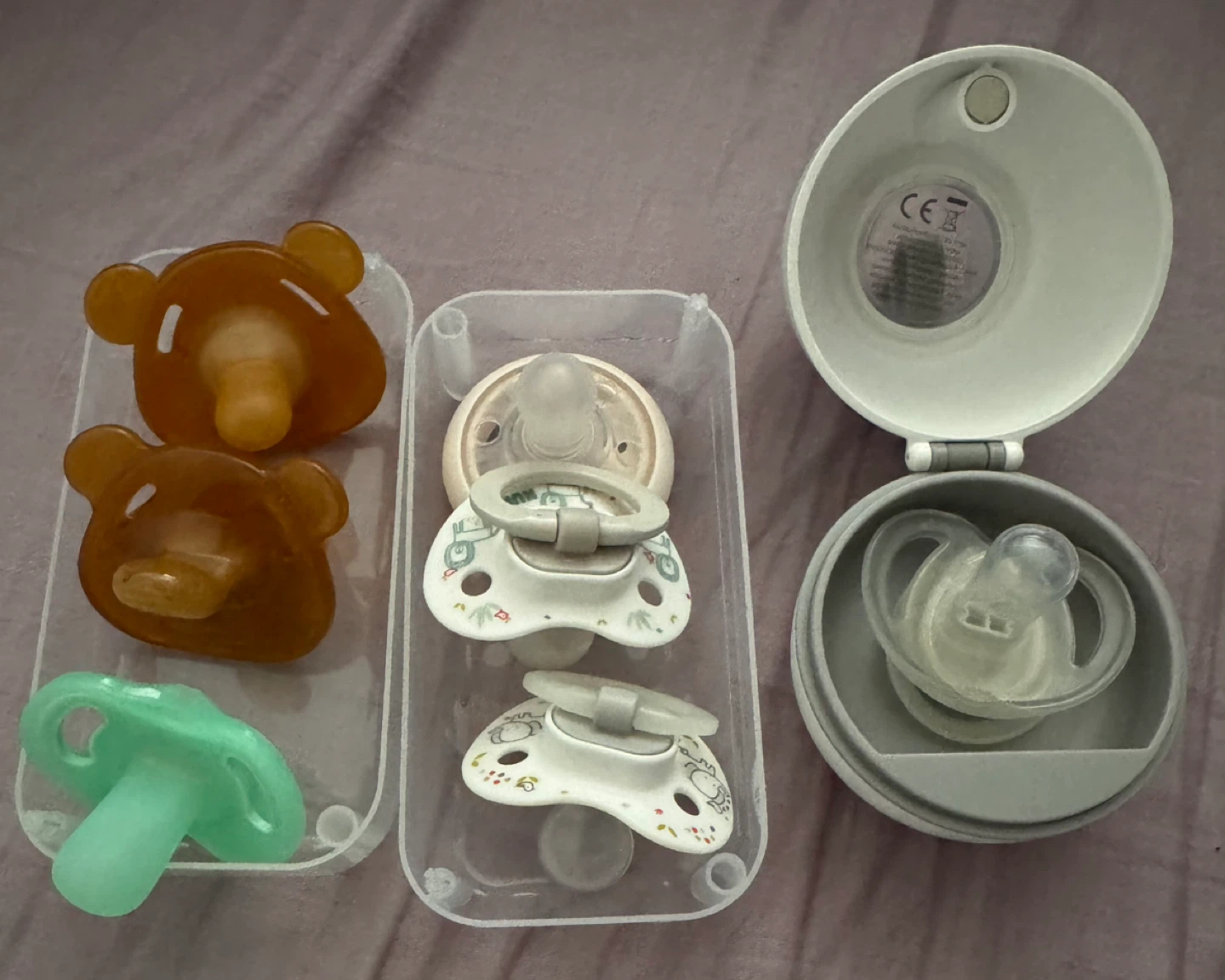 Assorted Baby Bottles and Pacifiers