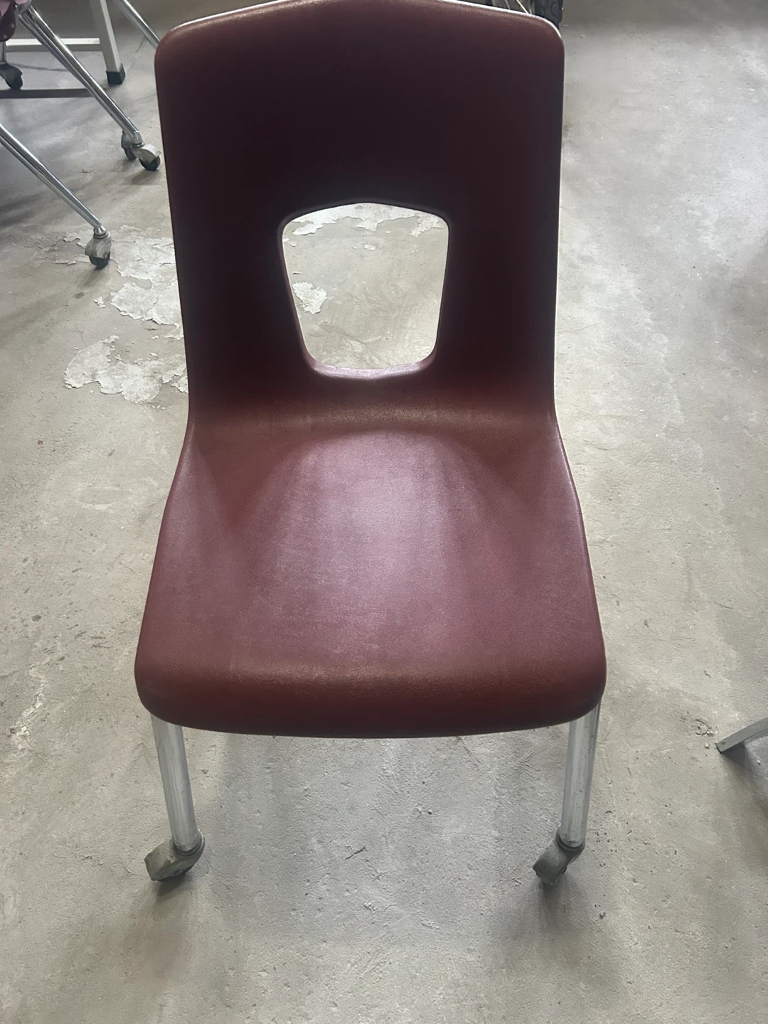 Maroon Plastic Chair with Wheels