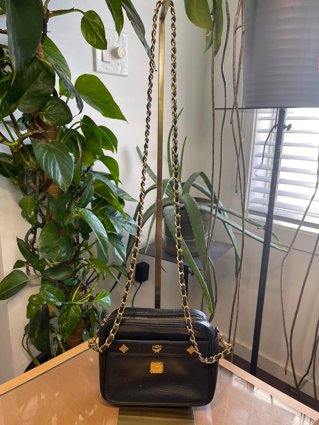 MCM Black Leather Crossbody Bag with Gold Chain Strap