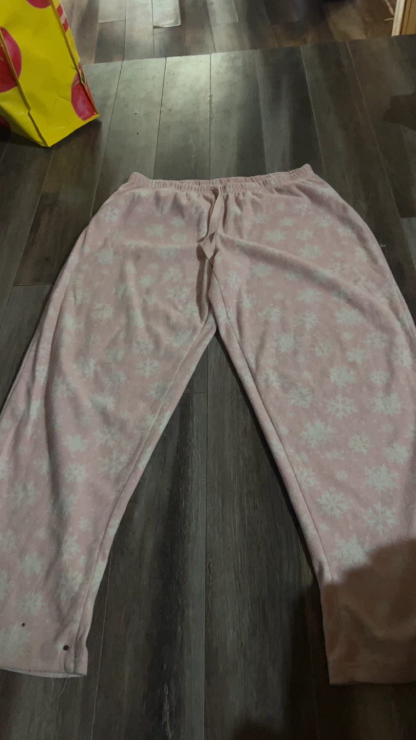 Pantalons de pyjama roses avec flocons de neige