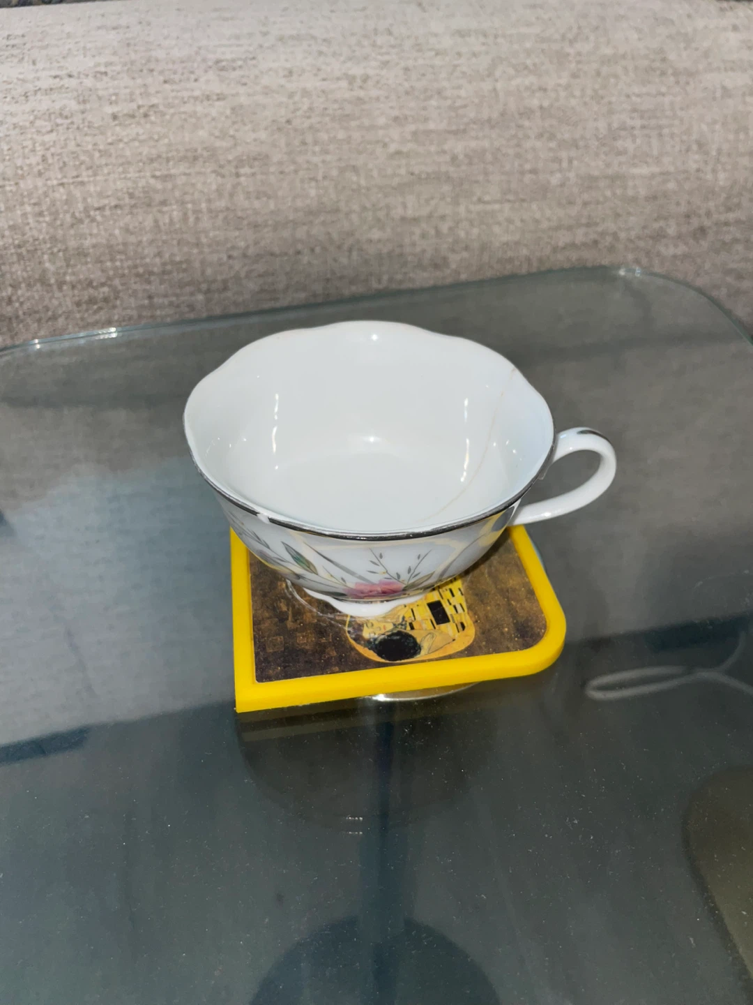 White Porcelain Teacup with Floral Design - photo 2