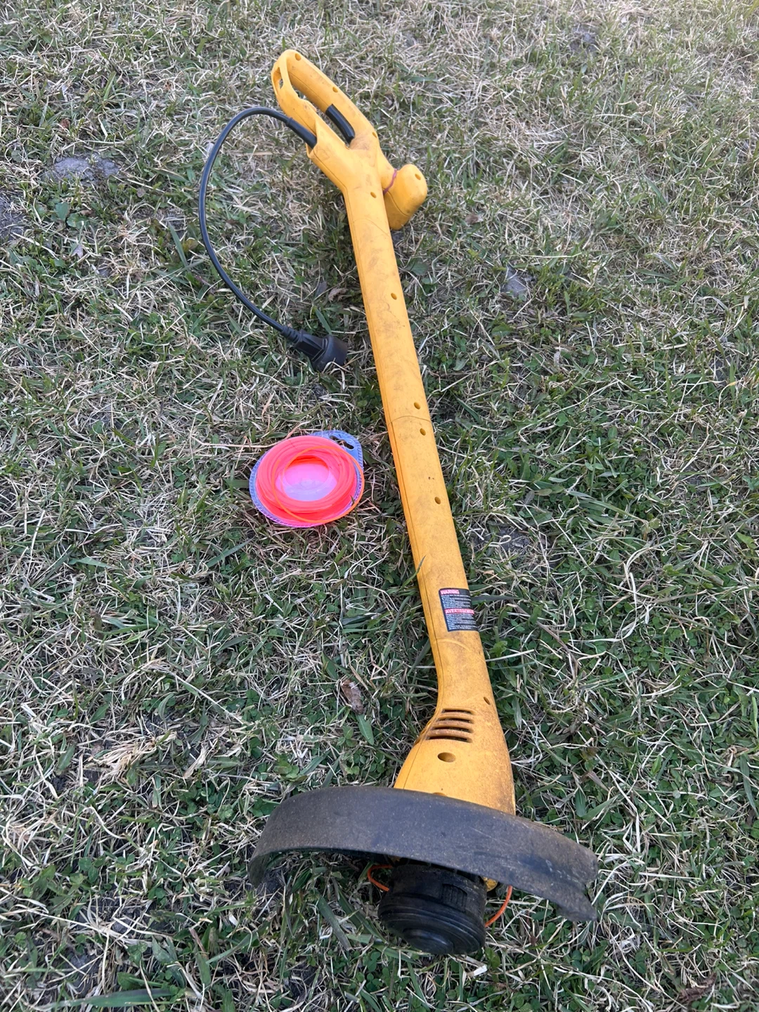 Yellow Electric String Trimmer