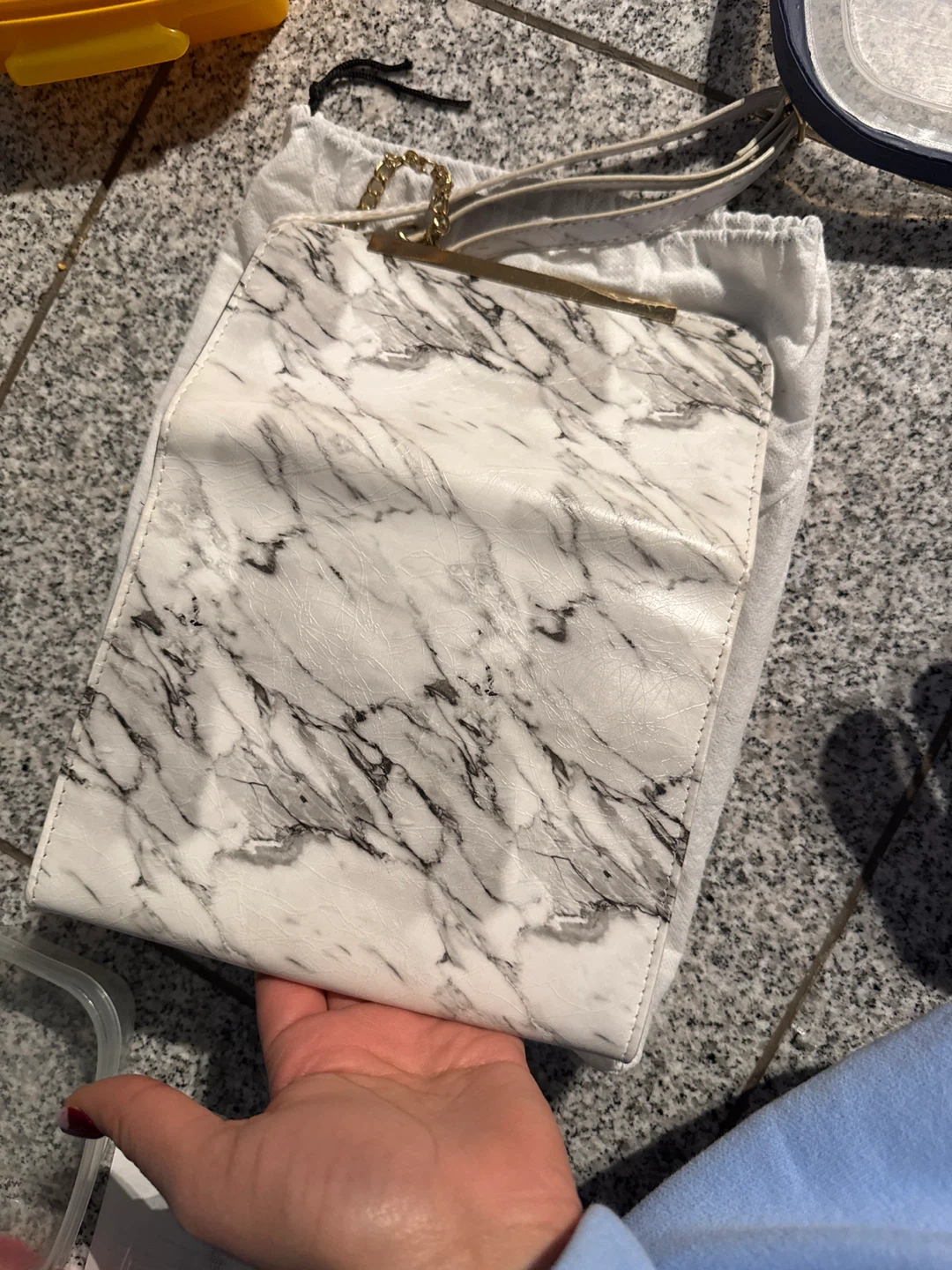 AI clutch bag with marble print - photo 3