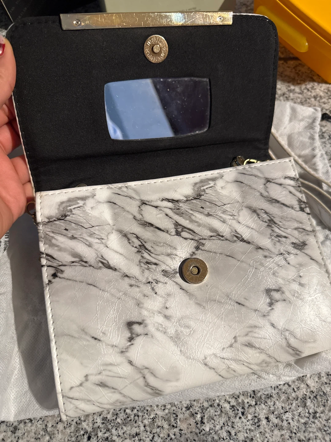 AI clutch bag with marble print - photo 2