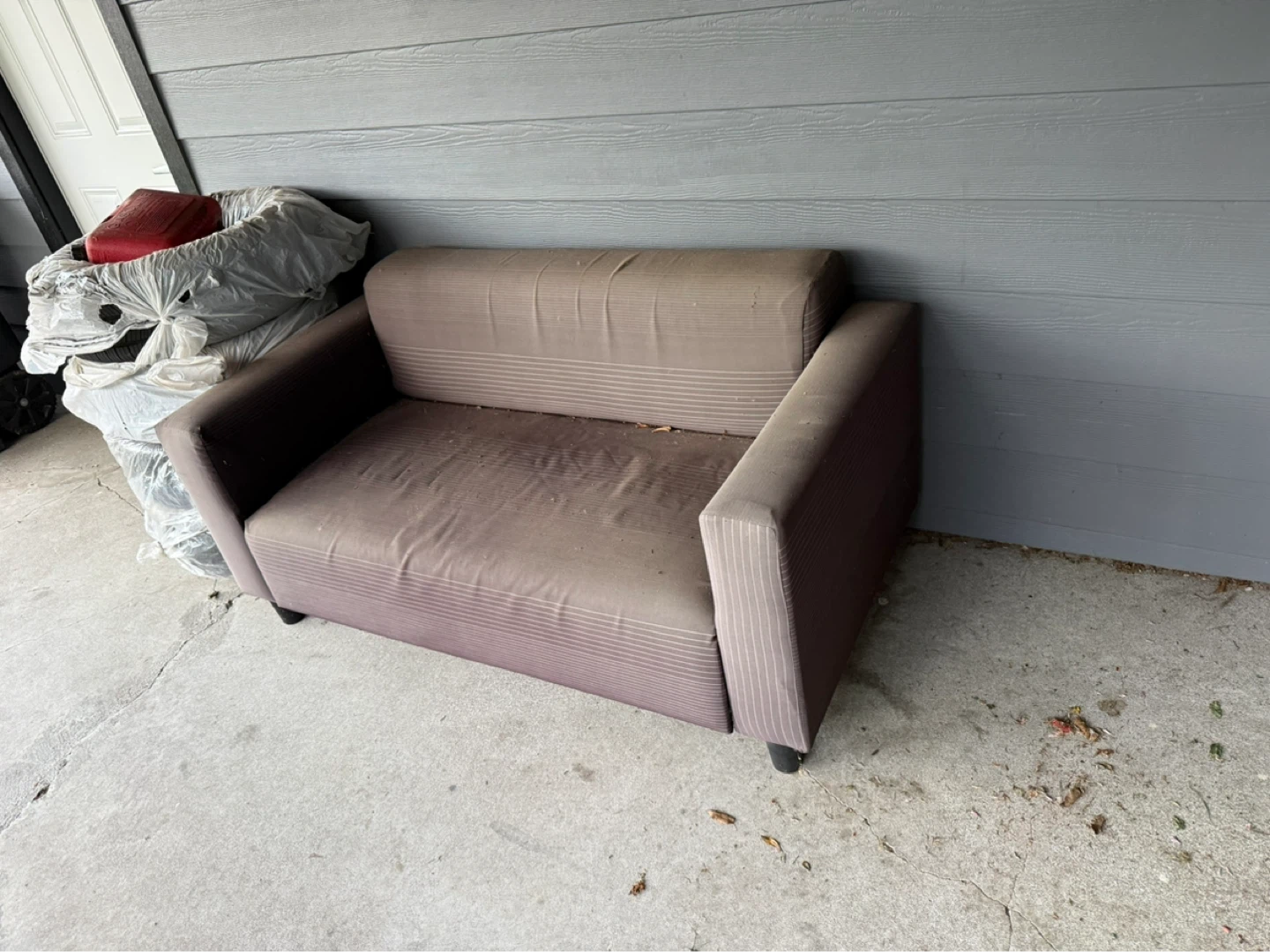Brown loveseat armchair