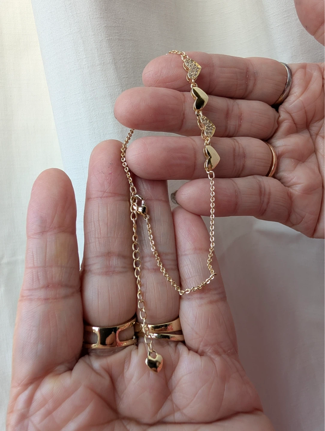 Gold Tone Bracelet with Heart Charms