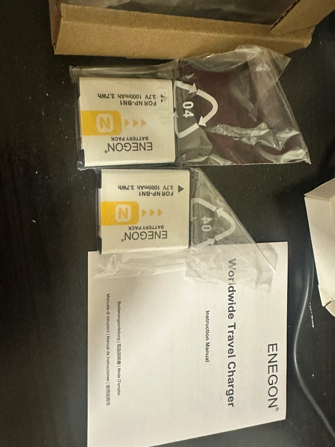ENegOn Worldwide Travel Charger with 2 Batteries - photo 2