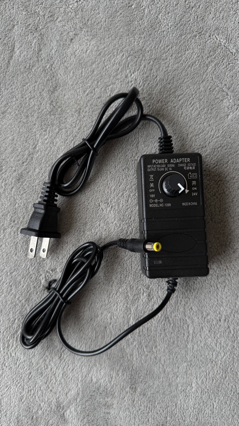 Universal Adjustable Power Adapter (18V-24V / 1A)