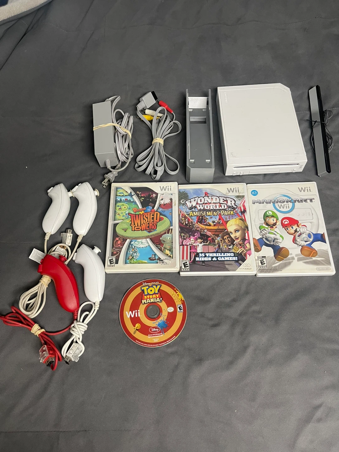 Nintendo Wii Console with Games and Controllers