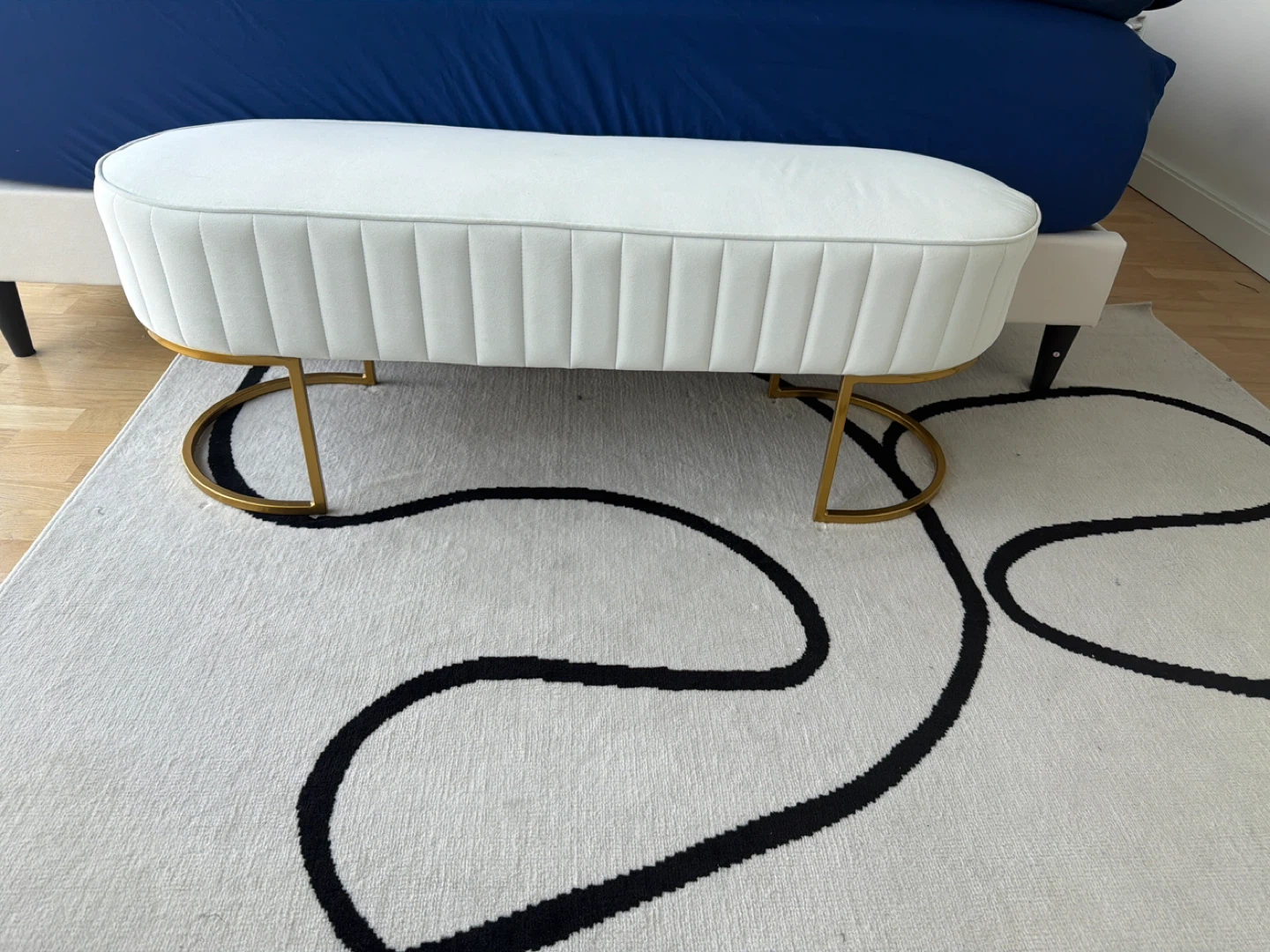 White Upholstered Bench with Gold Legs