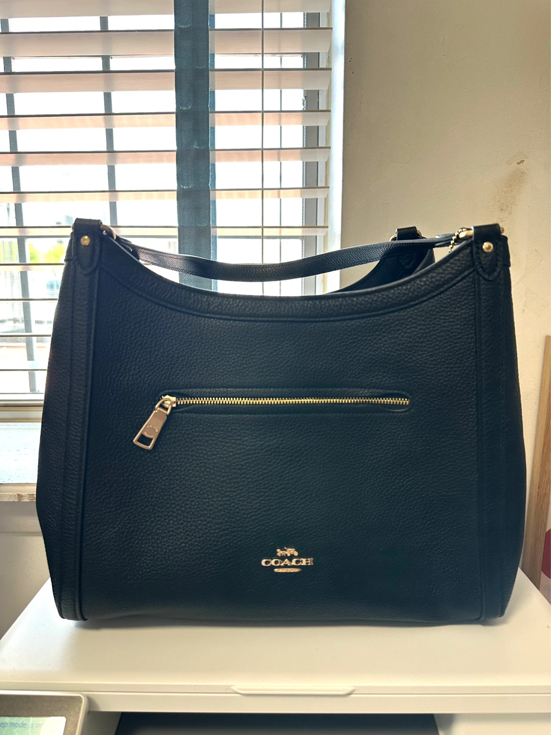 Black pebbled leather COACH hobo handbag