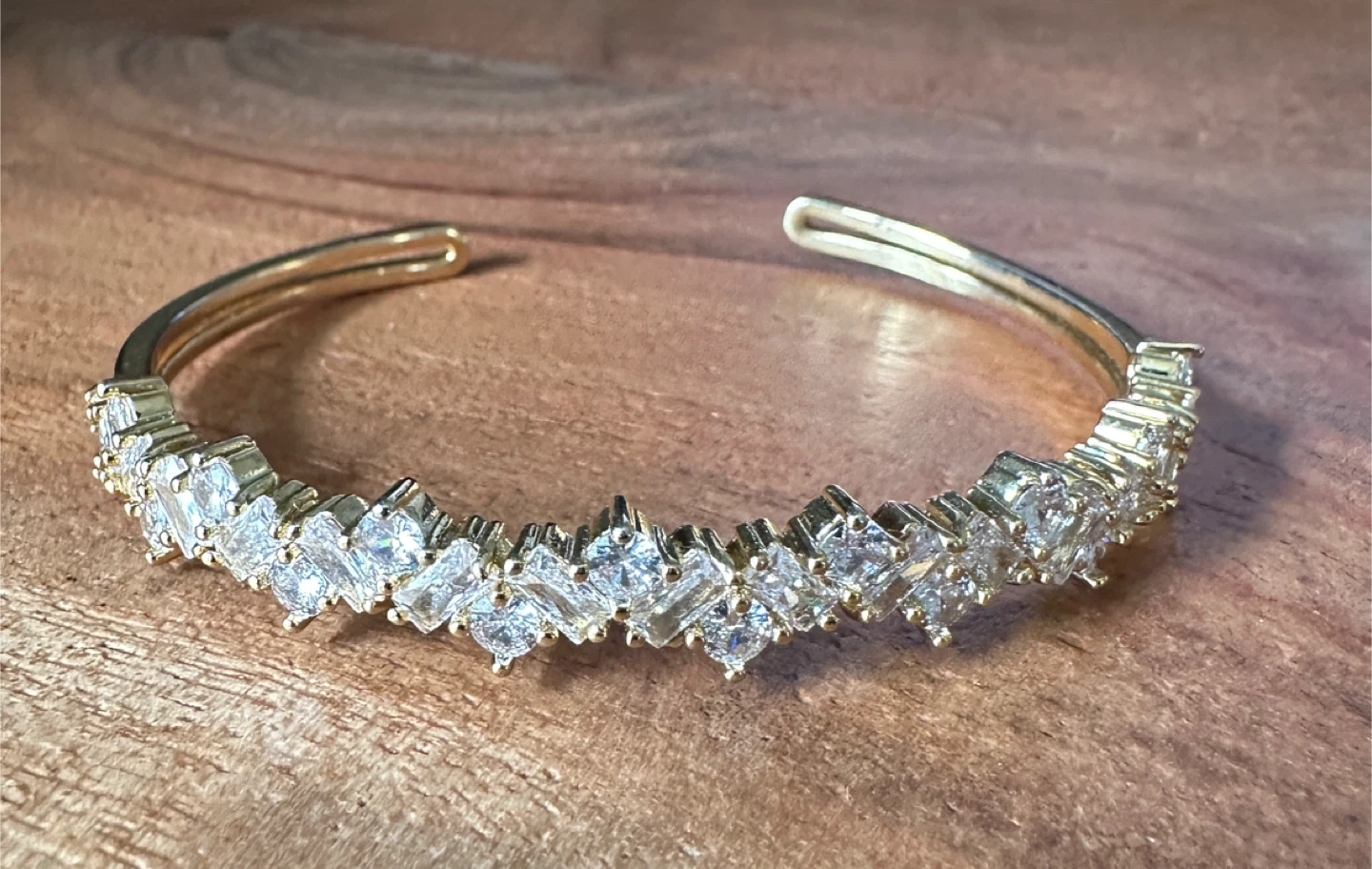 Gold-tone cuff bracelet with clear stones