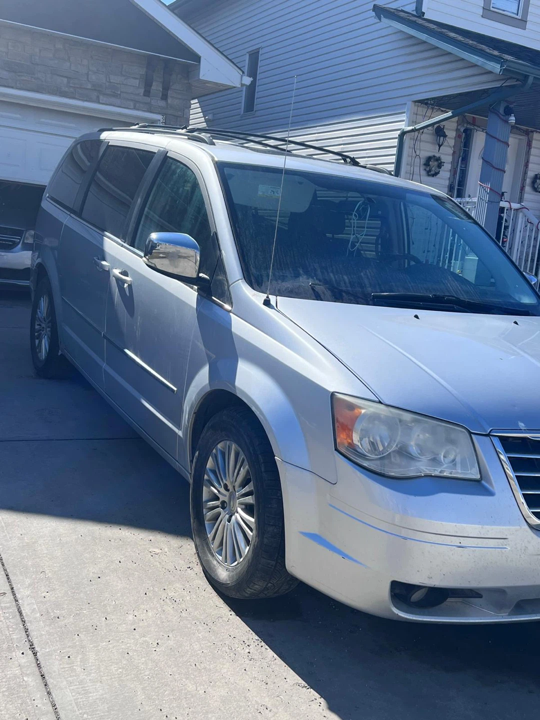 Silver Chrysler Town & Country Minivan