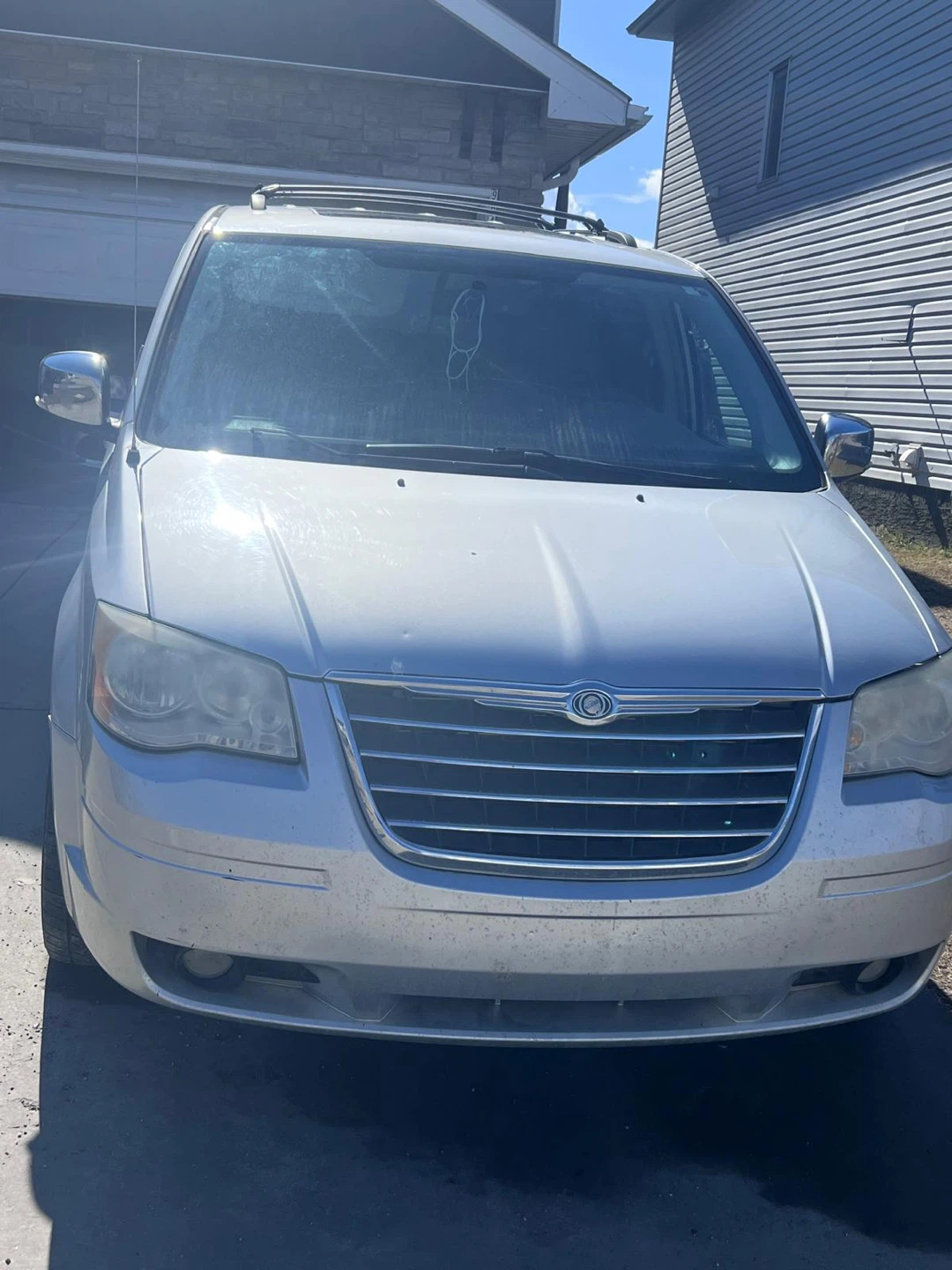 Silver Chrysler Town & Country Minivan - photo 2