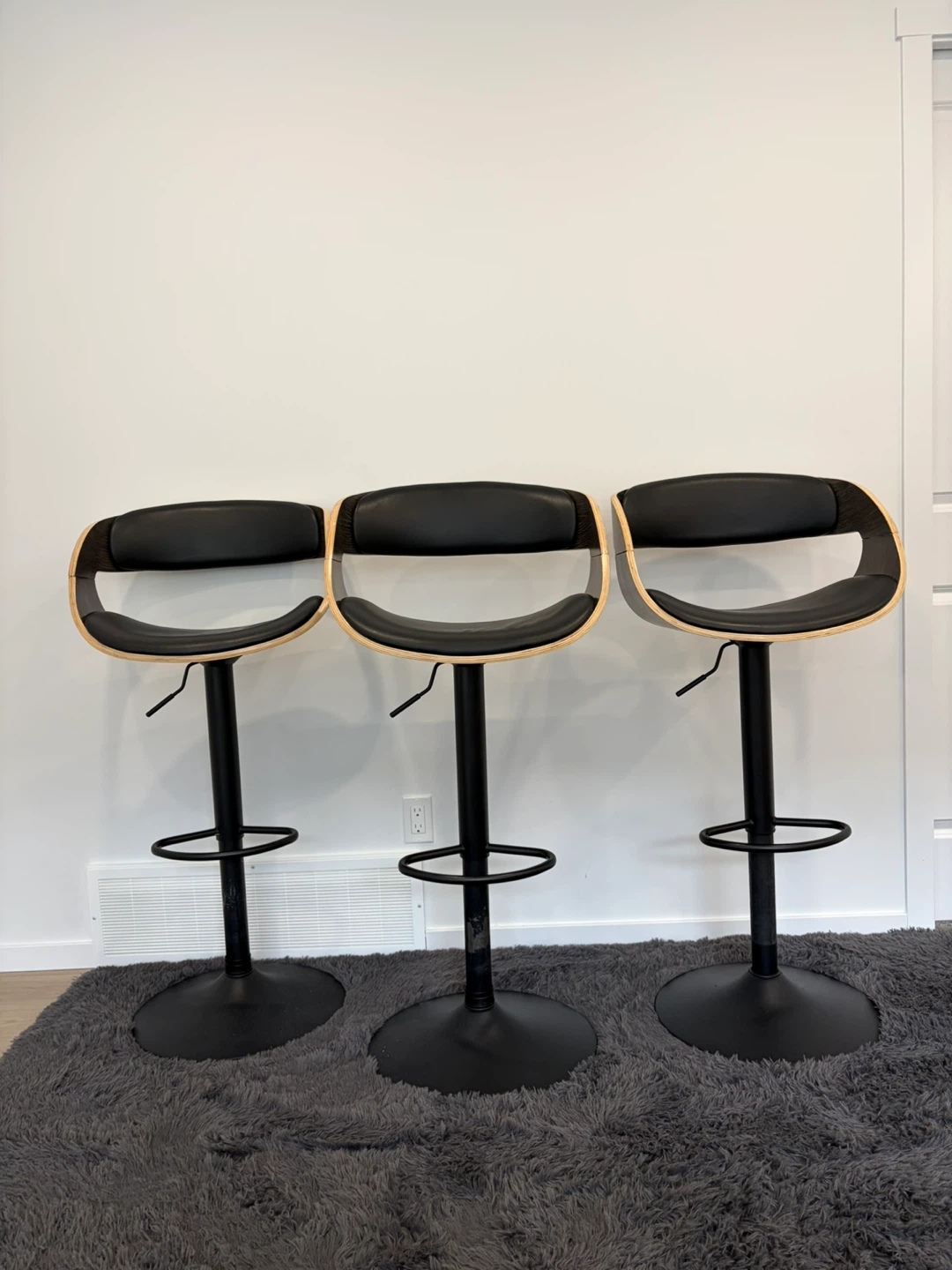 Set of 3 Black Adjustable Bar Stools with Wood Trim