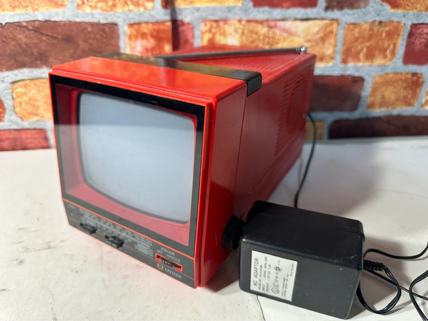 Vintage Red Citizen Portable Television and Radio