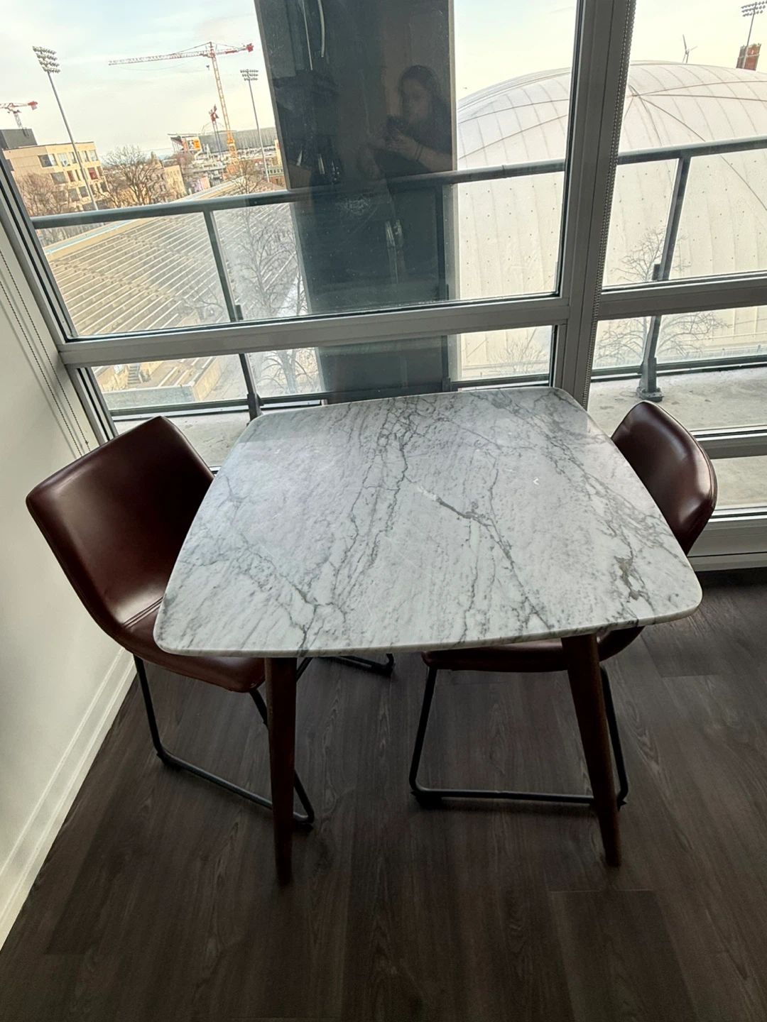 Marble top dining table with two chairs