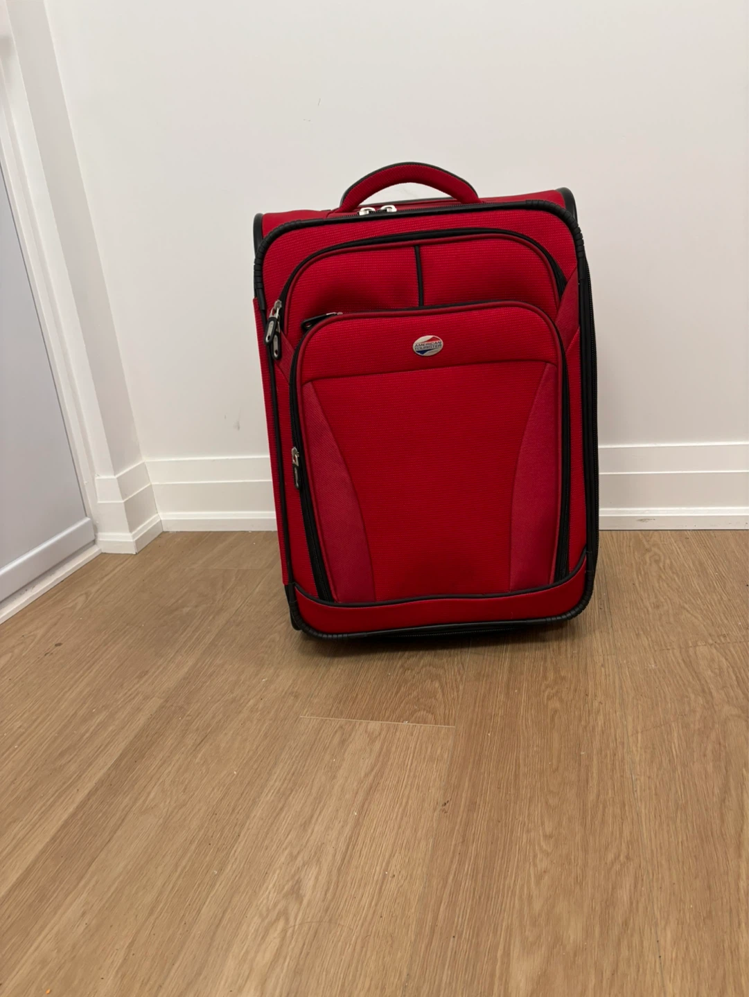 American Tourister Red Carry-On Spinner Luggage