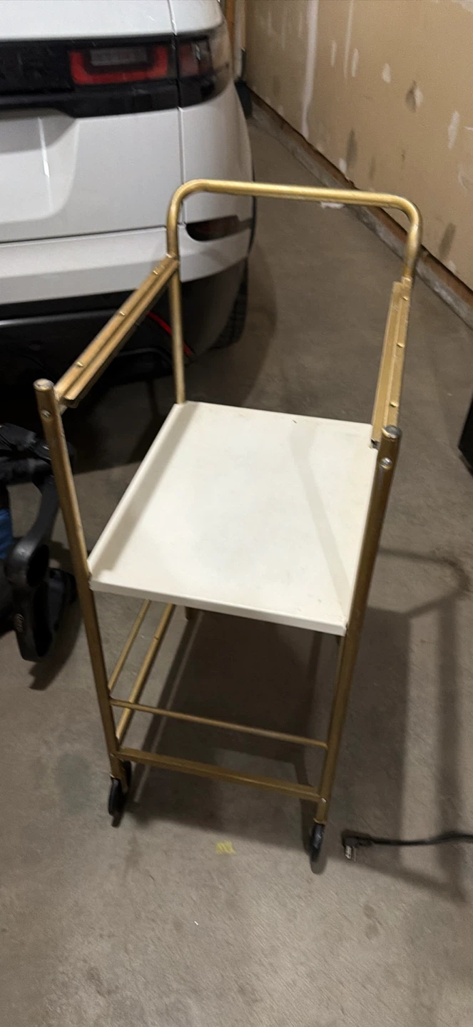 Gold Metal and White Rolling Bar Cart