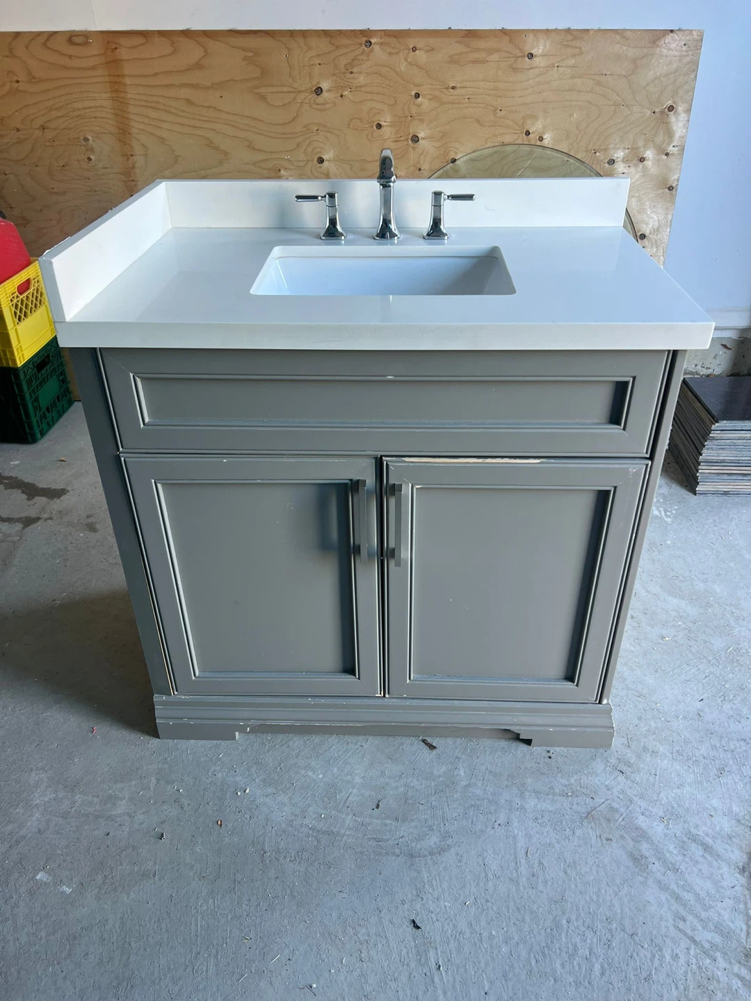 Grey Bathroom Vanity with White Countertop and Sink