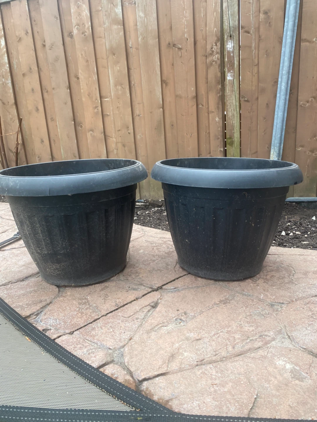 Two Black Plastic Planters