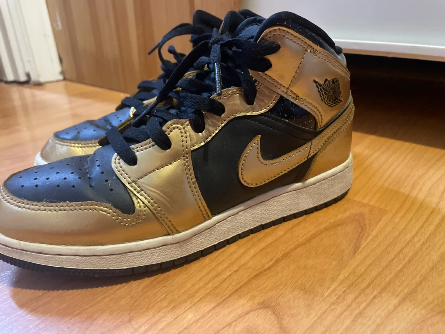 Nike Air Jordan 1 Mid Gold Black Sneakers