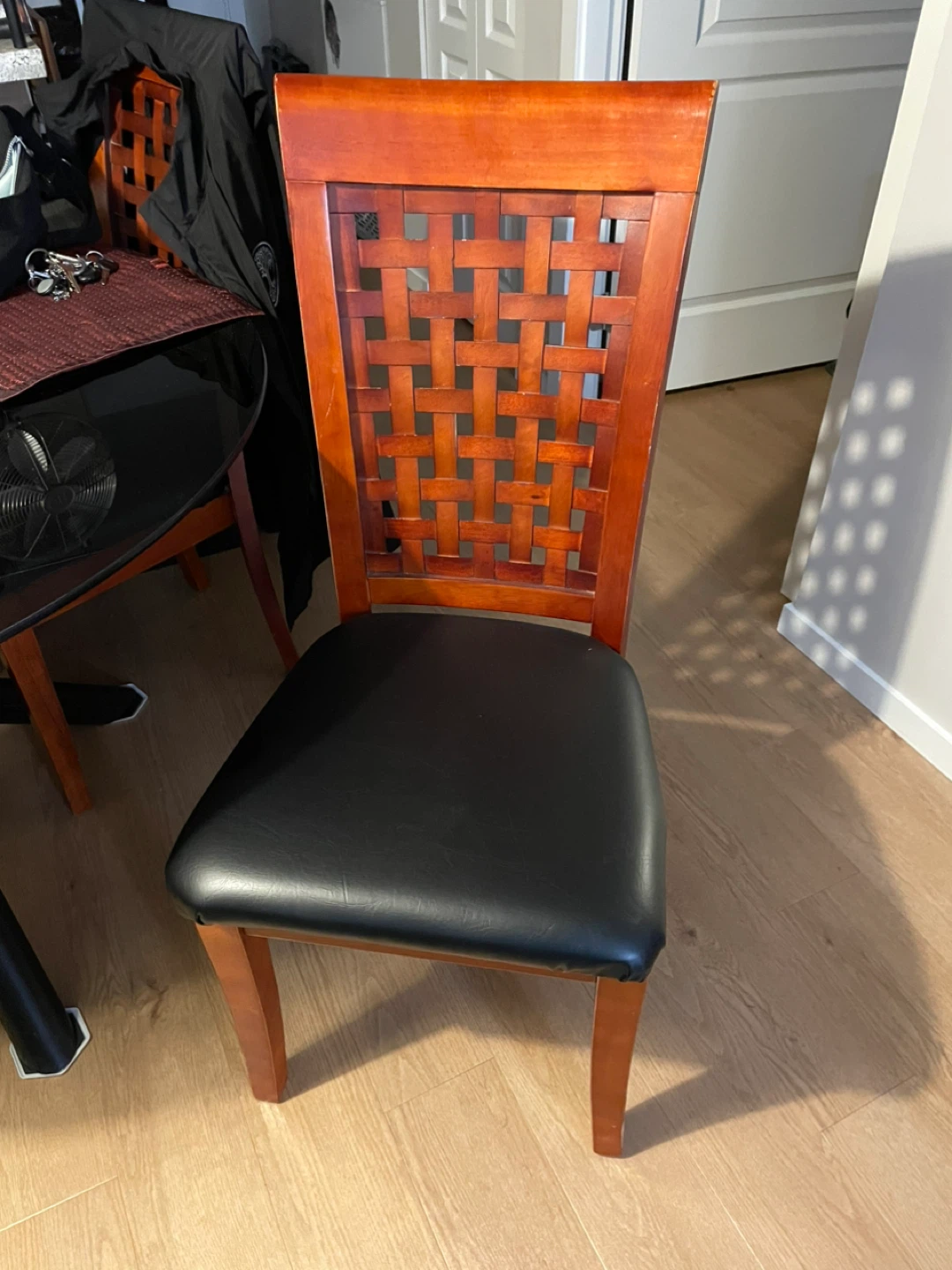 4 Chairs with Woven Back and Black Seats