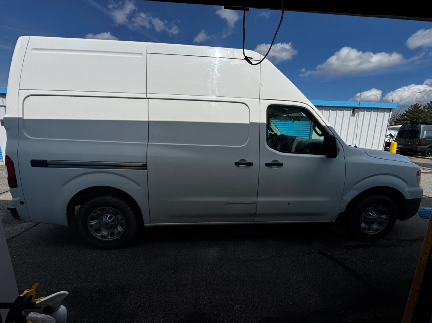 White Nissan NV2500 Cargo Van - photo 3