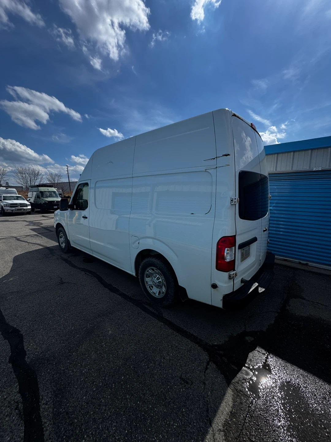 White Nissan NV2500 Cargo Van - photo 4