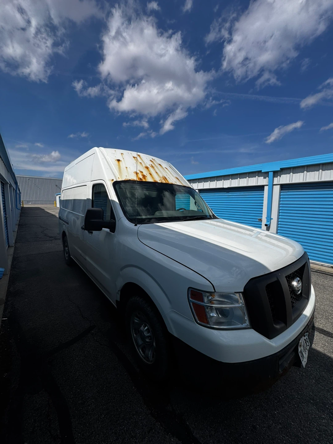White Nissan NV2500 Cargo Van - photo 2