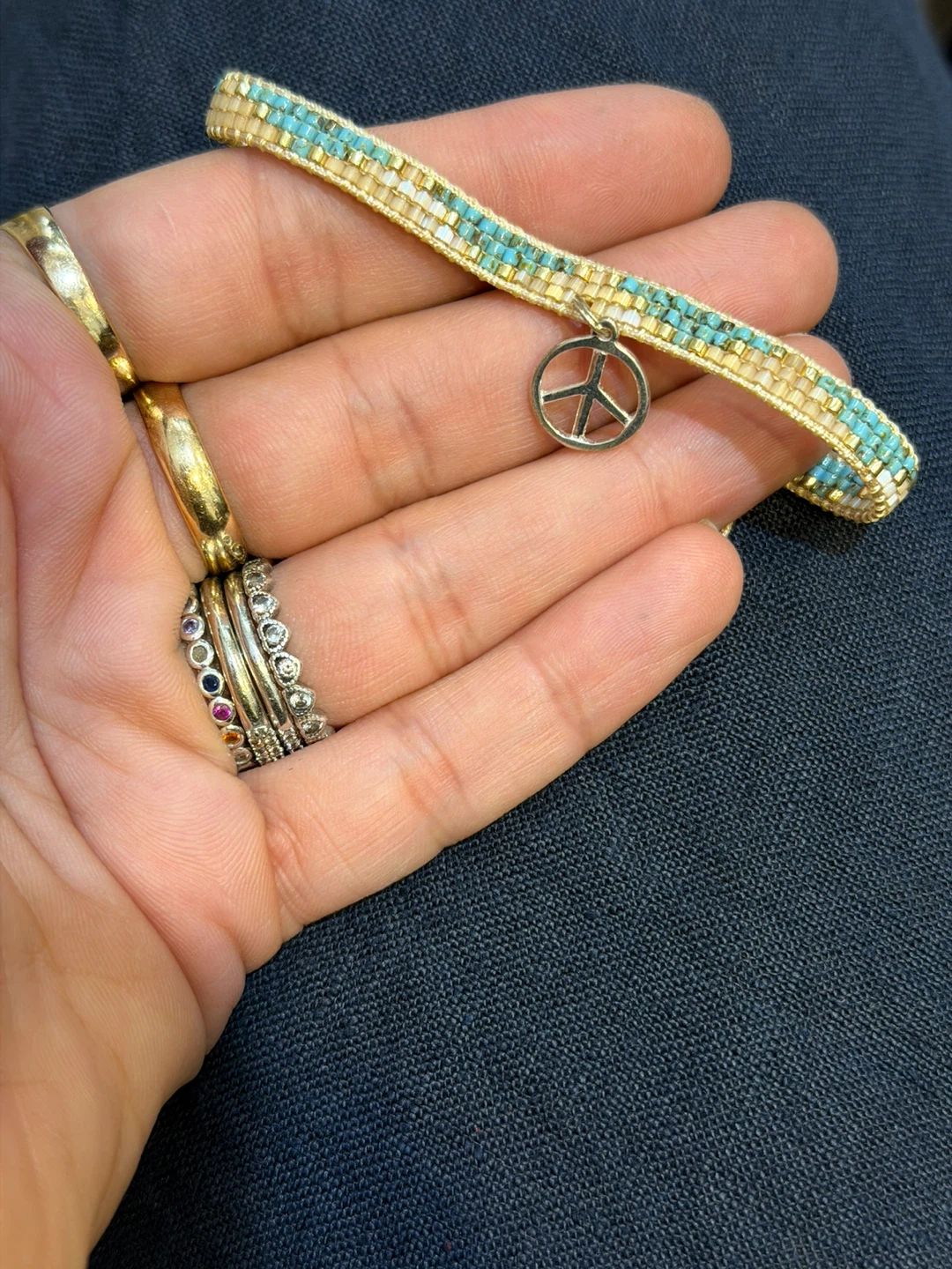 Handmade Beaded Bracelet with 925 Sterling Silver Inukshuk Charm - photo 2