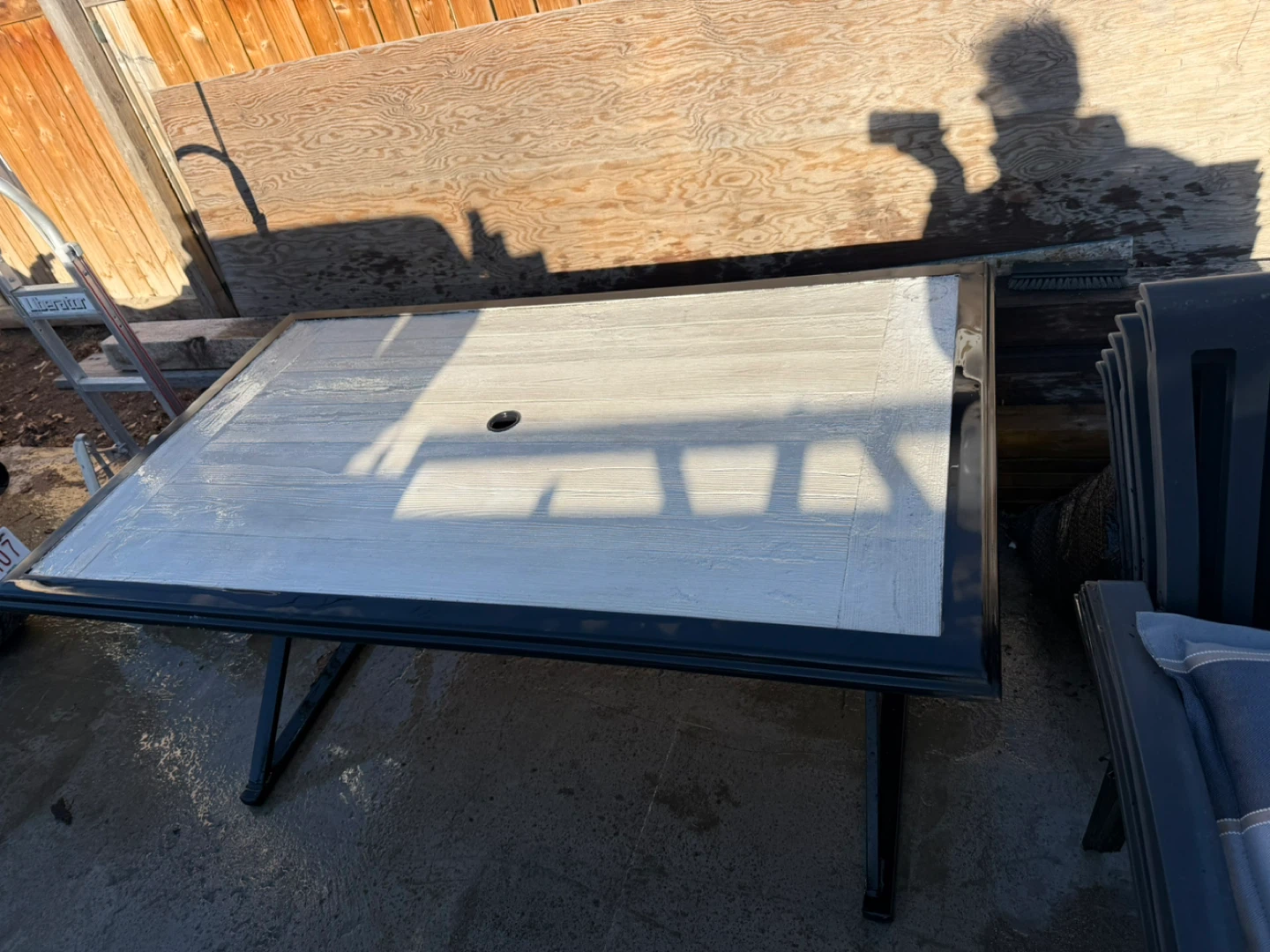 Outdoor patio table with cushions