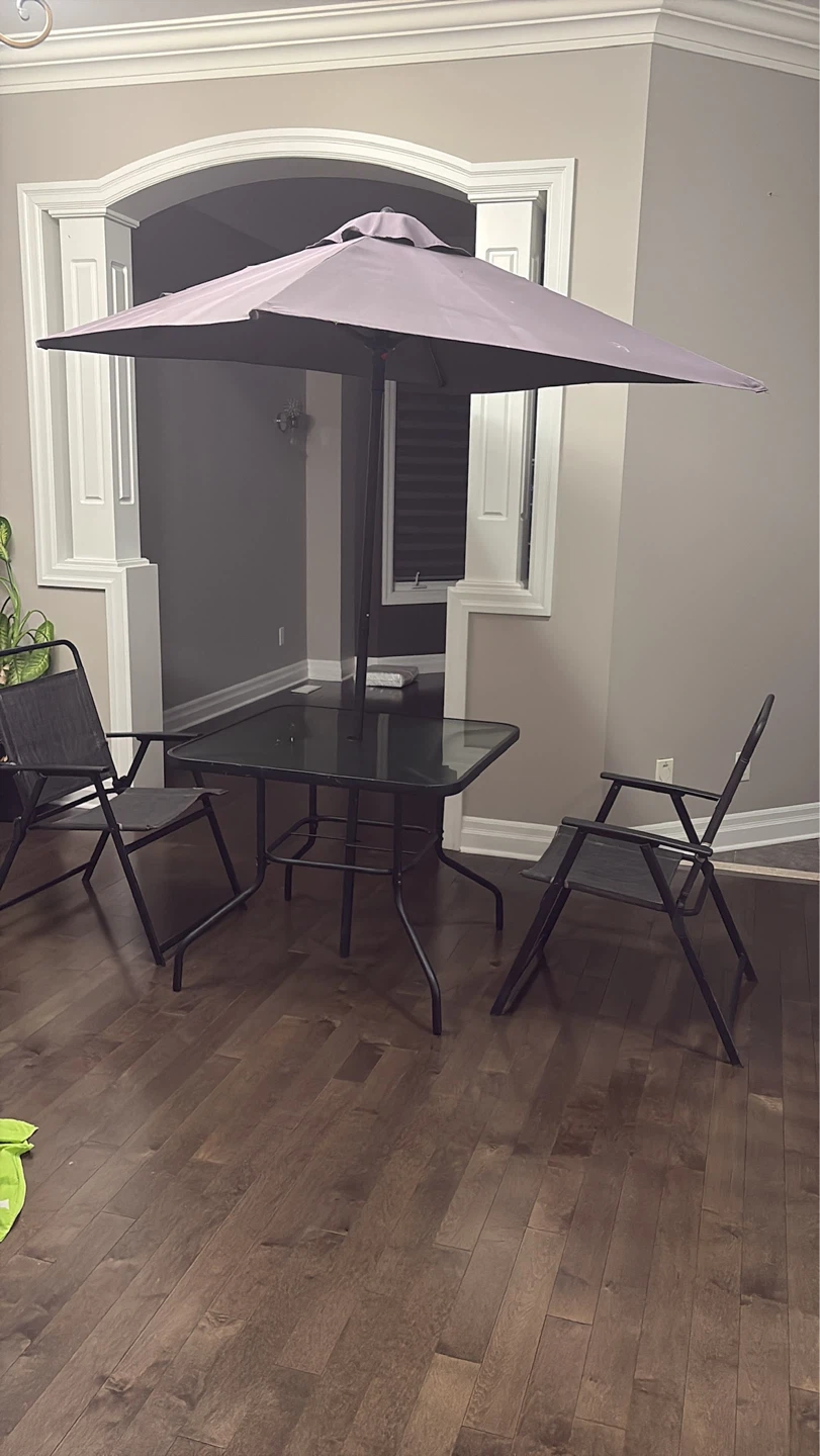 Glass patio table with umbrella and two chairs - photo 2
