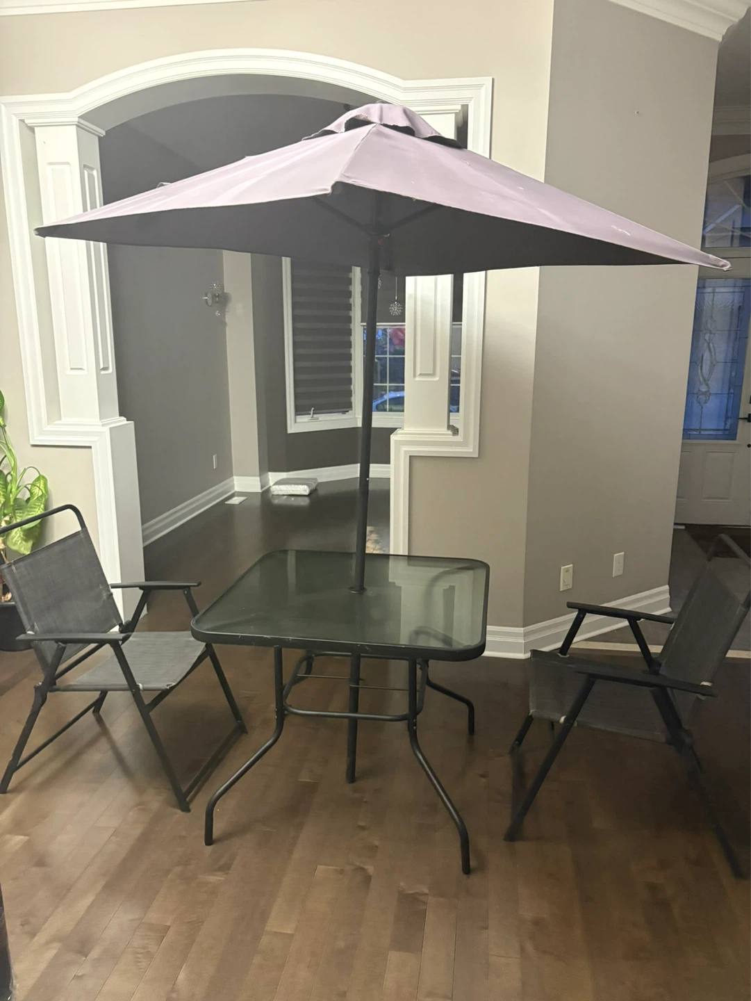 Glass patio table with umbrella and two chairs - photo 3