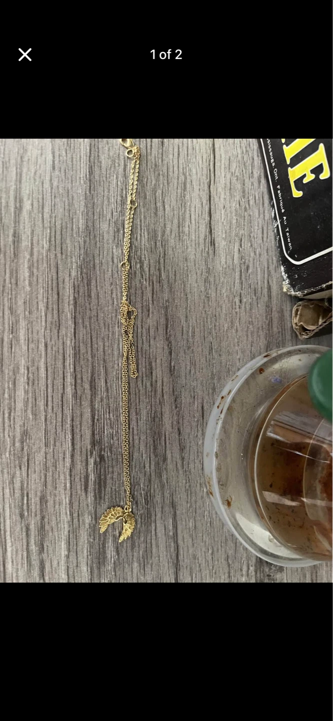 Gold-tone angel wing and chakra stone necklace