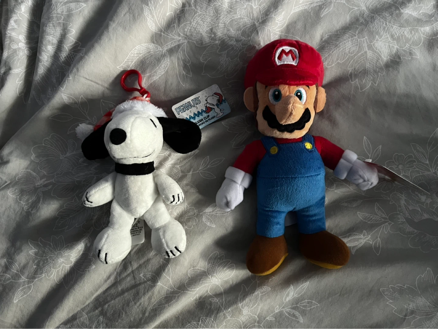 Snoopy and super Mario plushies