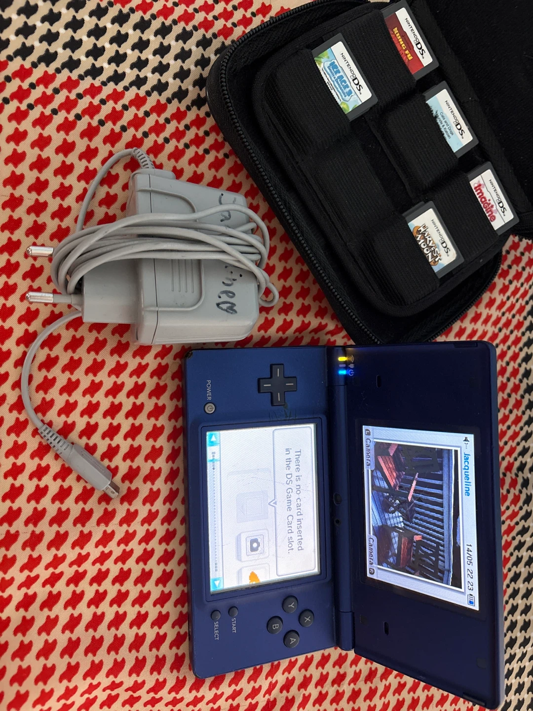 Nintendo DS i console + Games, Charger and Portable