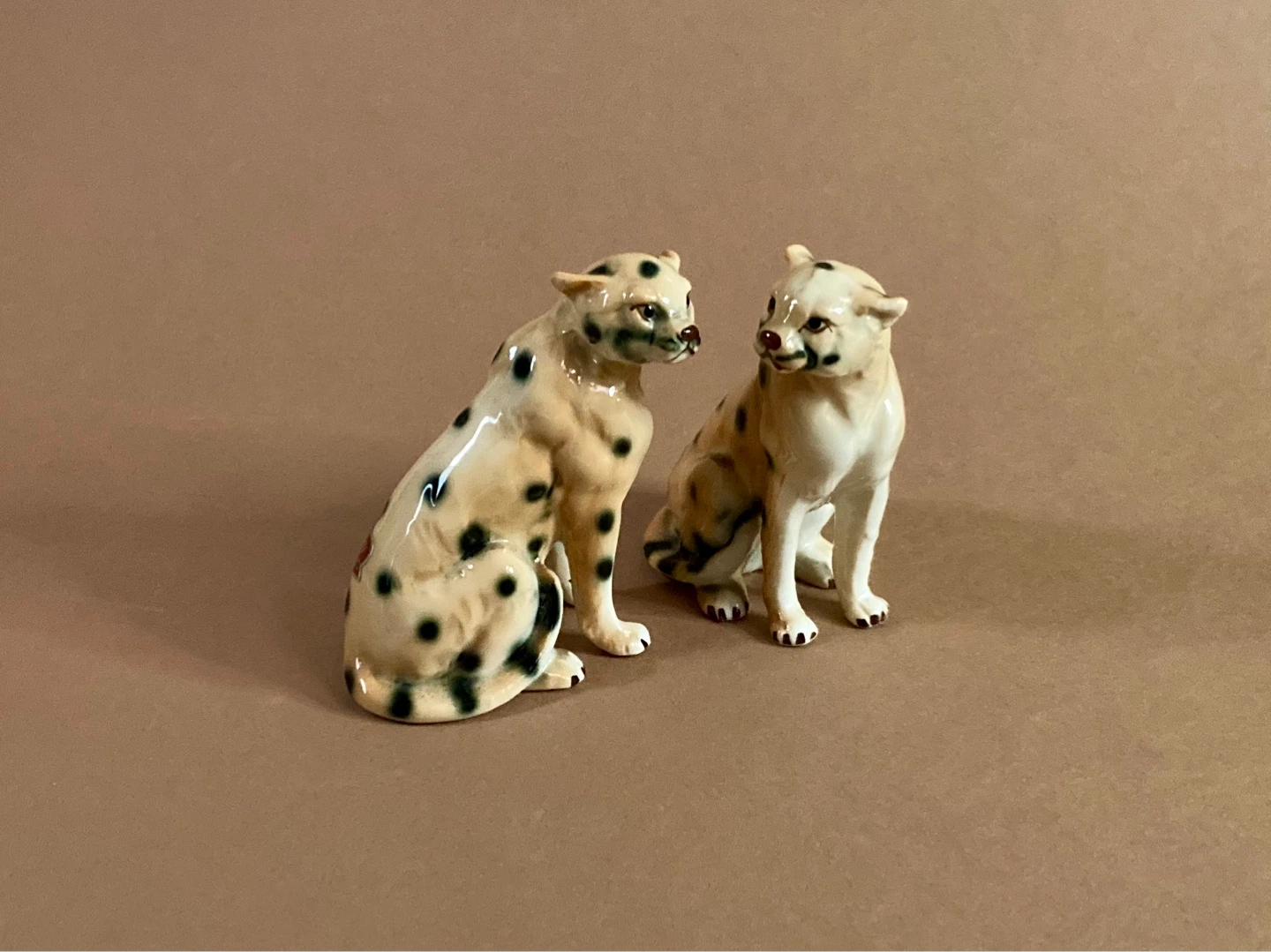Pair of vintage hand painted leopard figures