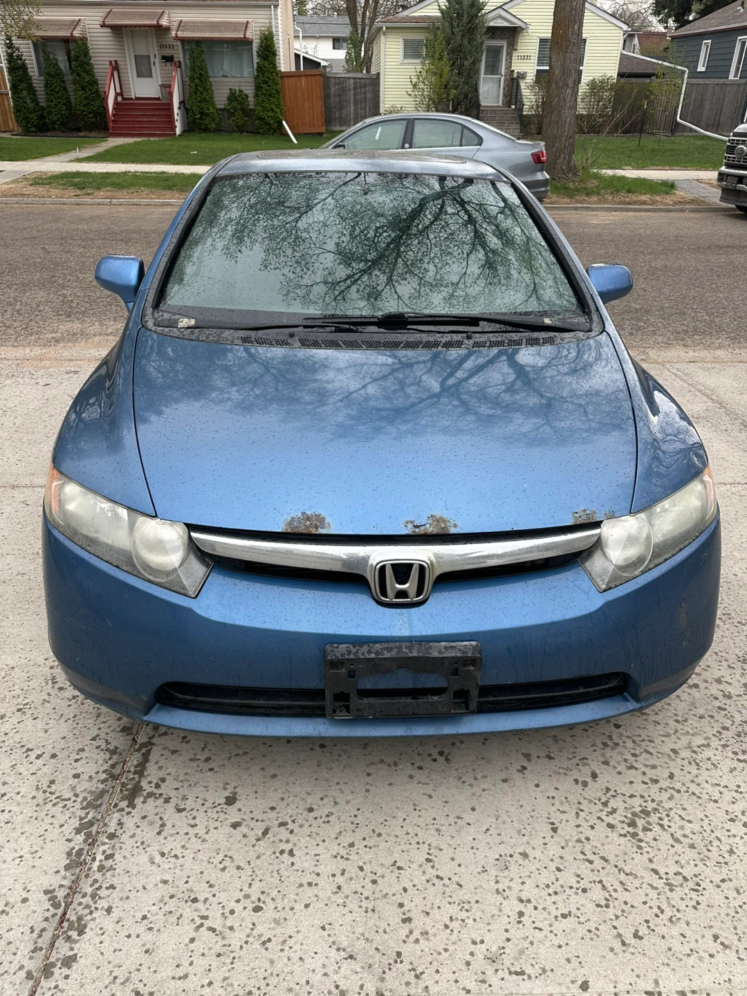 2008 Honda Civic Sedan - Blue. Rebuilt title
