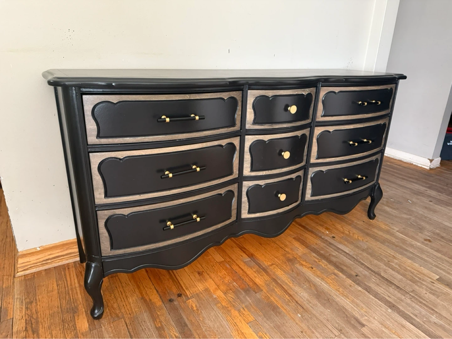 Black Dresser with Gold and Natural Wood Accents