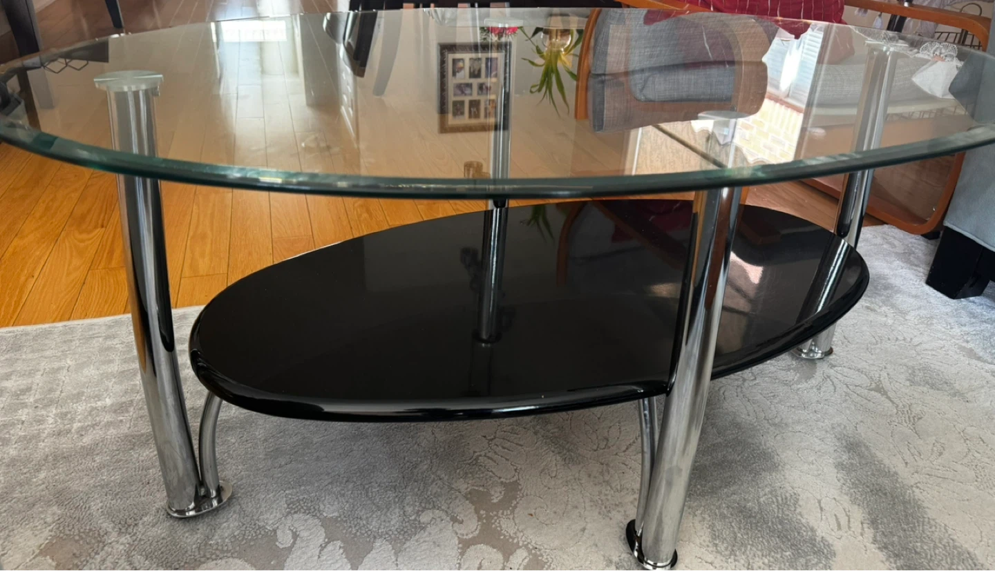 Oval Glass Coffee Table with Black Shelf