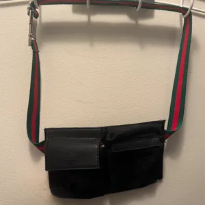 Faux Gucci Black GG Canvas Monogram Belt Bag