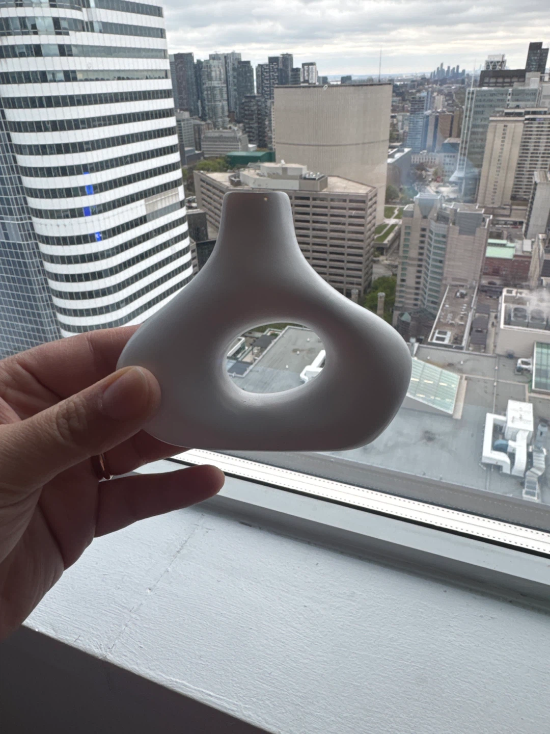 White Ceramic Vase with Hole