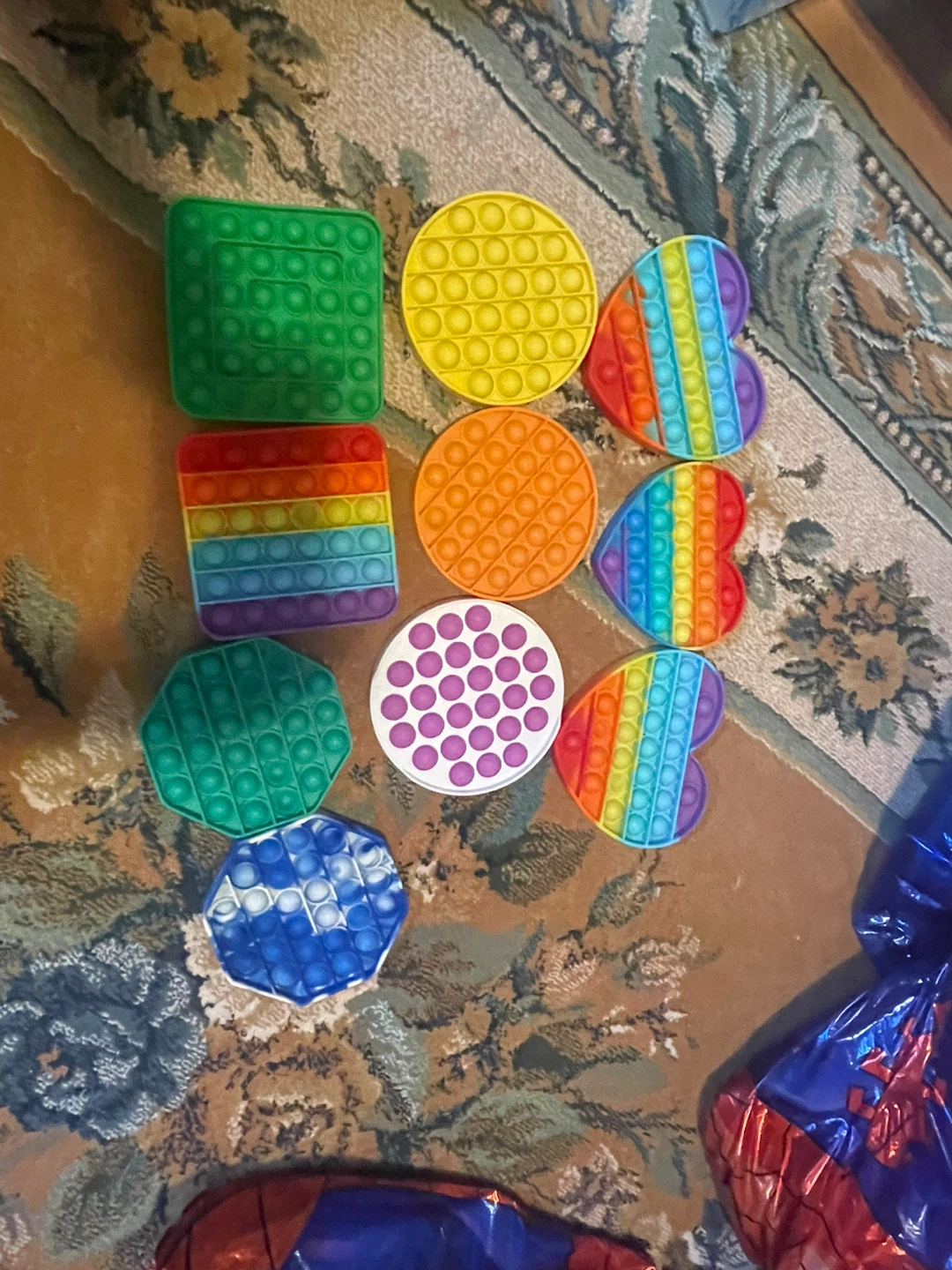 Assorted Pop-Its and fidget toys (swipe photos)