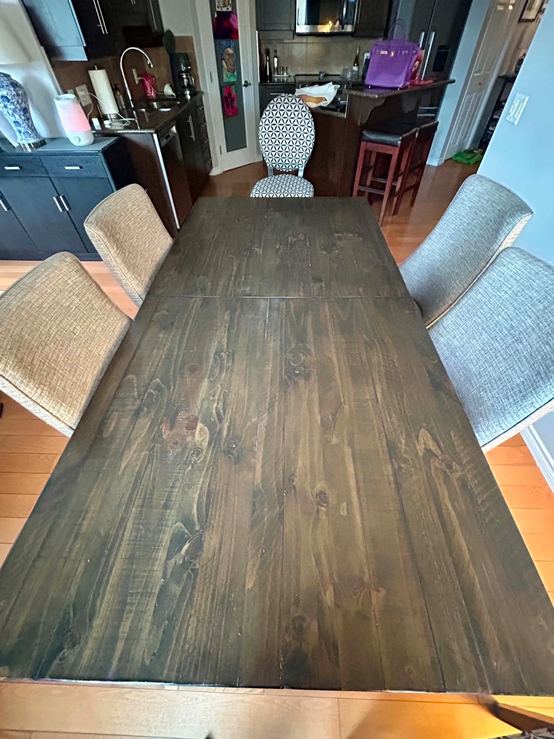Solid carob wood dining table and six grey fabric chairs. - photo 3