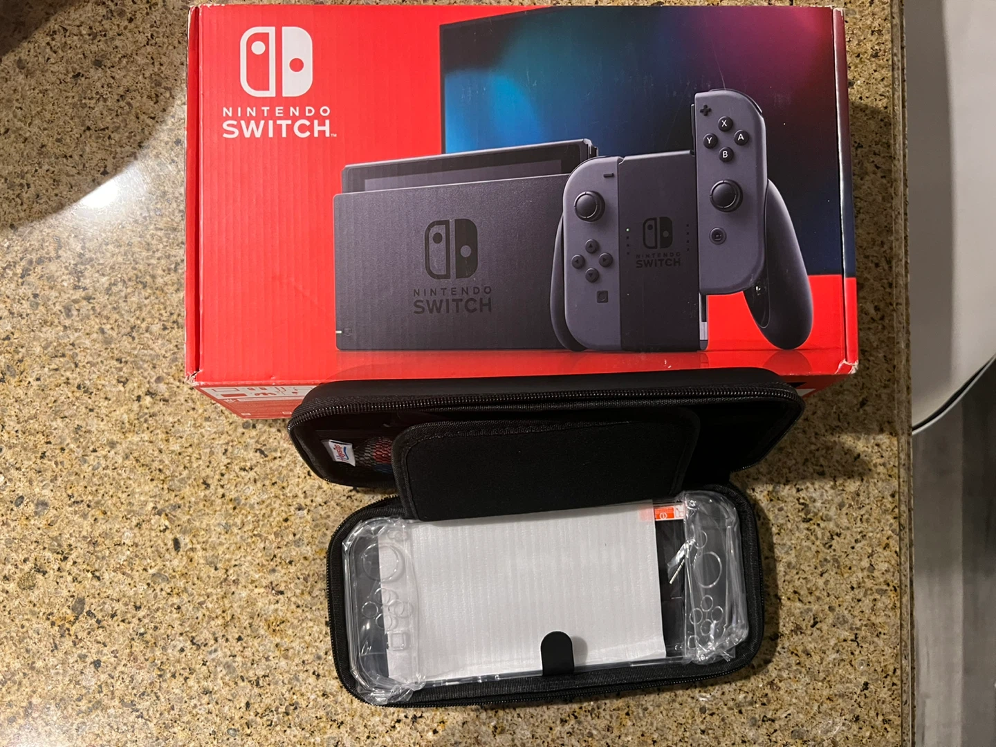 Brand New Nintendo Switch with case, screen protectors