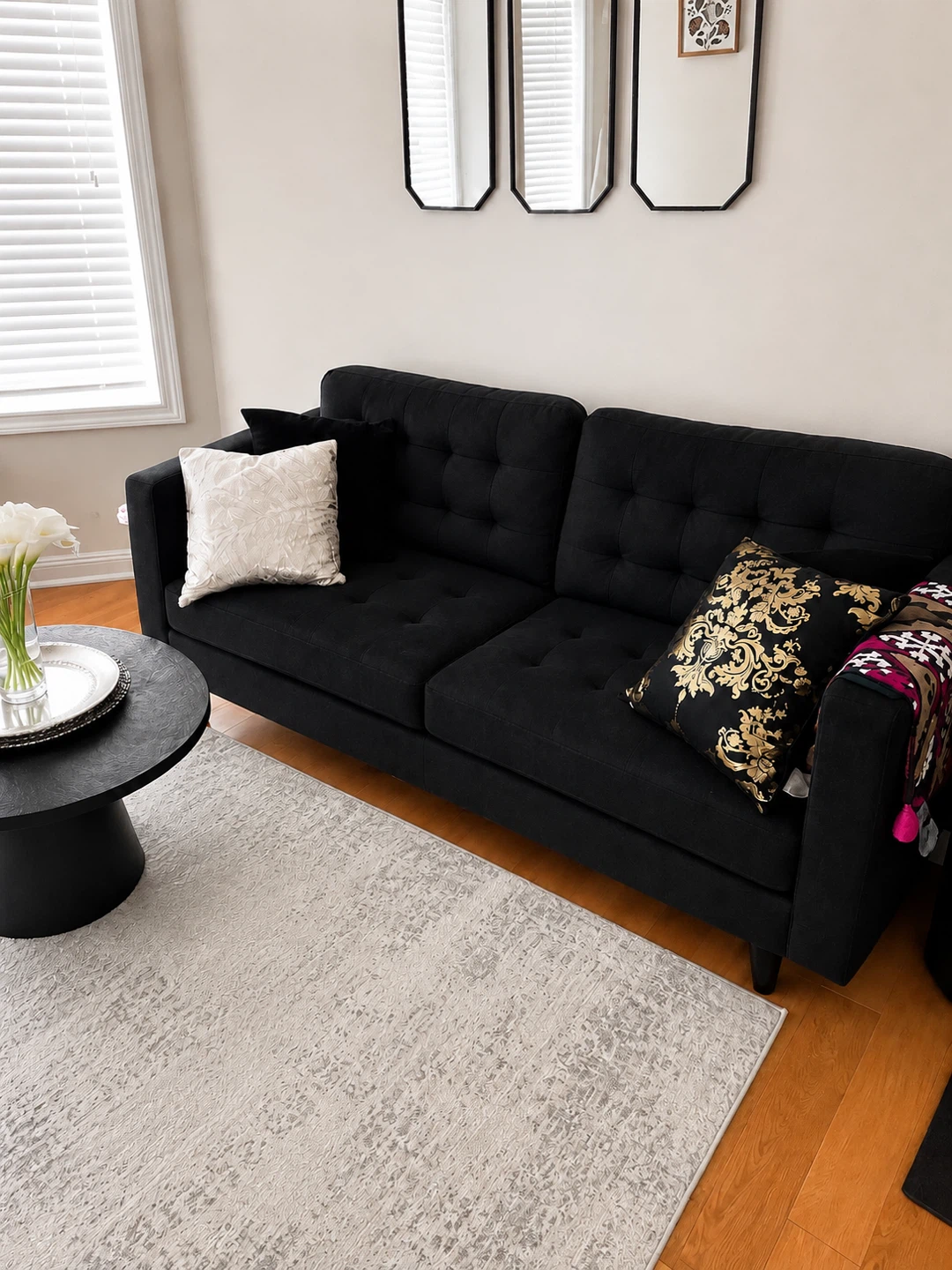 Black Tufted Sofa