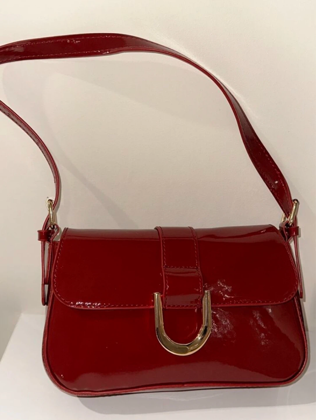 Red patent leather shoulder bag