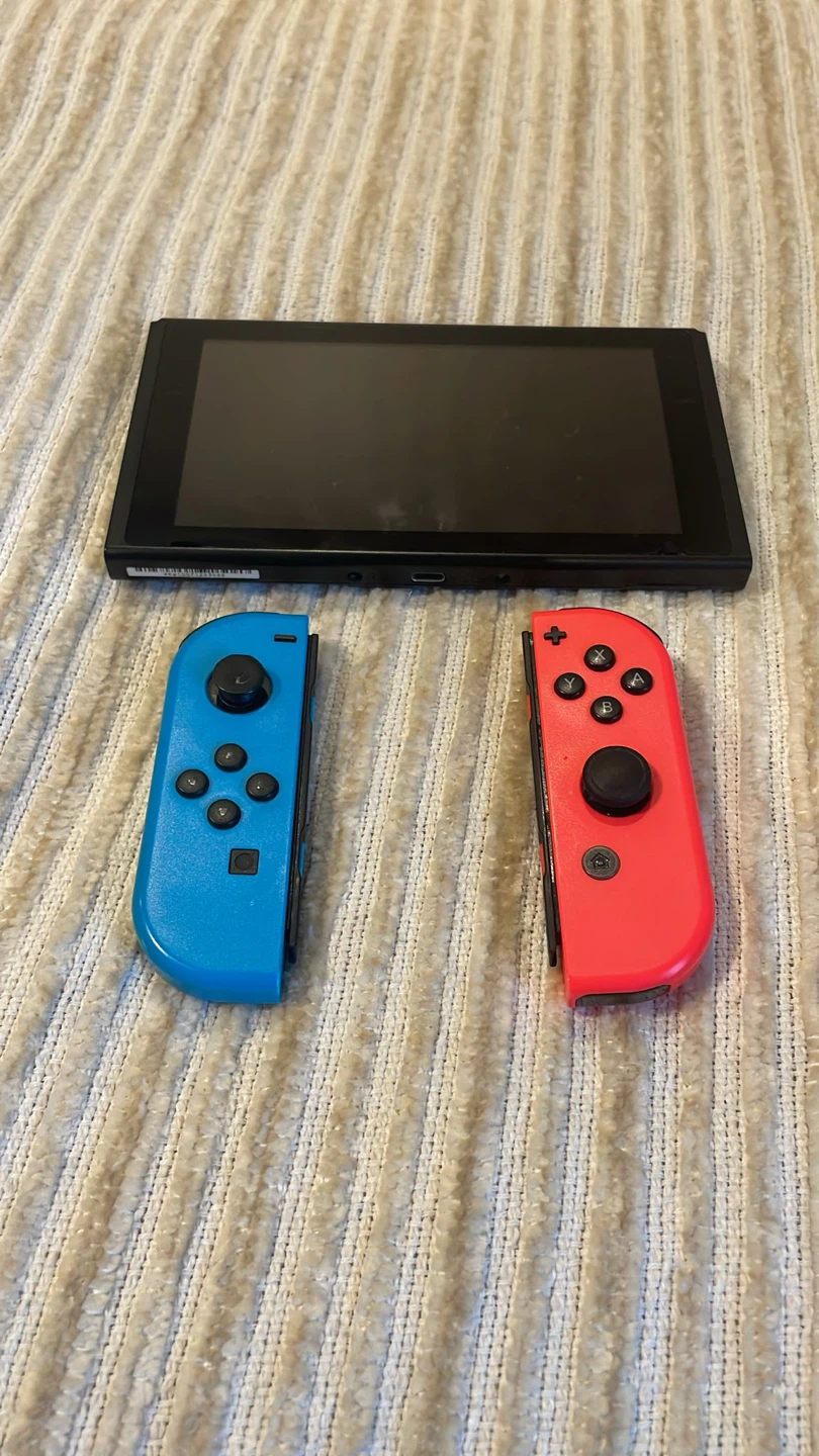 Nintendo Switch Console with Red and Blue Joy-Cons